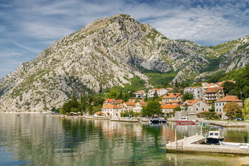 Fototapeta na wymiar Sunny view of beautiful village Orahovac on Kotor Bay, Montenegro.