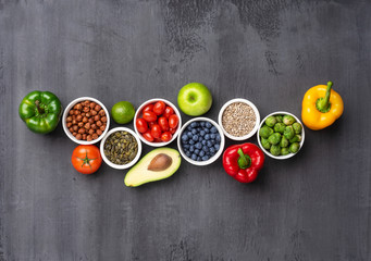 Healthy eating ingredients: fresh vegetables, fruits and superfood. Nutrition, diet, vegan food concept