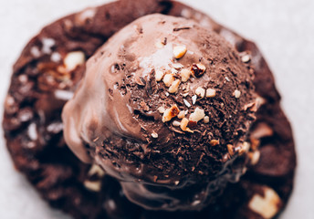 Rich and Indulgent Chocolate Ice Cream Scoops with dark chocolate pieces on a plate