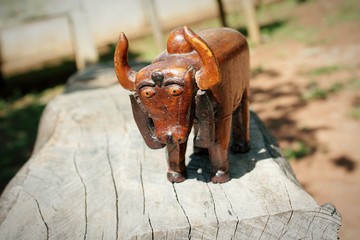 Ox carved in wood adorning the garden of the country house in the interior