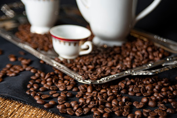 The image, aroma and flavor of coffee. Arrangement with coffee and accessories.
