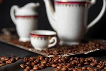 The image, aroma and flavor of coffee. Arrangement with coffee and accessories.