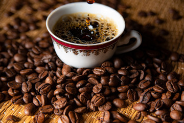 The image, aroma and flavor of coffee. Arrangement with coffee and accessories.