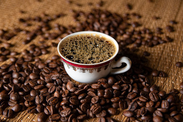 The image, aroma and flavor of coffee. Arrangement with coffee and accessories.