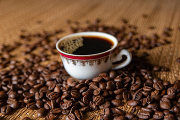 The image, aroma and flavor of coffee. Arrangement with coffee and accessories.