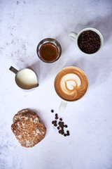 Coffee, milk and cookie
