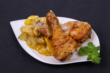 Roasted chicken legs with potato