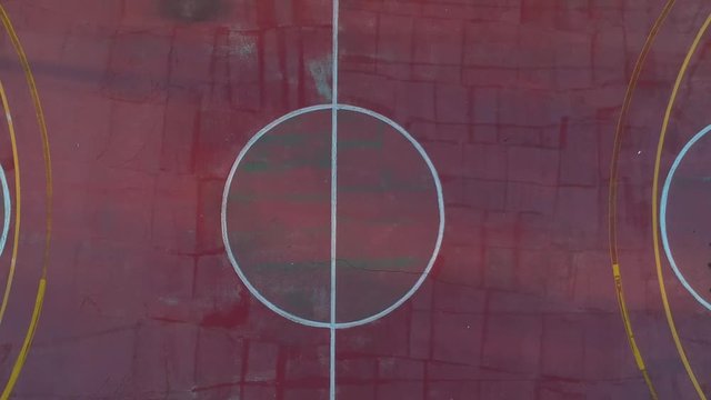 Ascending over the center, aerial drone shot over basketball courts in a sports complex in Poseidonio, Thessaloniki Greece