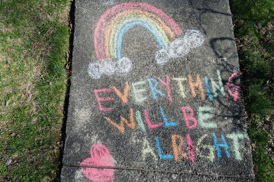 Hopeful message written on sidewalk in chalk during Covid 19 pandemic