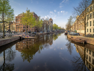 View over the Keizersgracht canal and homomonument on a spring afternoon during Corona lockdown