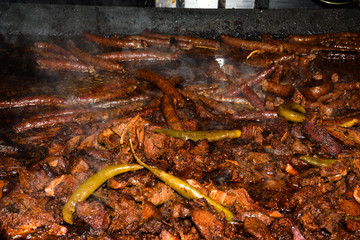 Unhealthy, greasy, oily, mix of meat slices