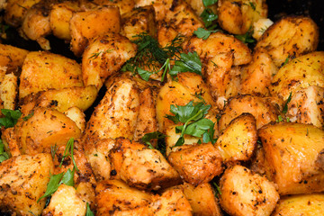 Baked potato wedges with cheese.