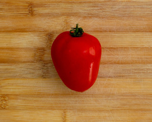 tomatoes over wood table