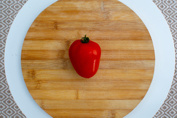 tomatoes over wood table