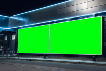Blank citylight for advertising on the building at city, copyspace for your text, image, design. Media marketing, ads, promo announcement, commercial propose or message. Banner, template chromakey.