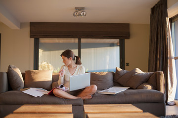 Young woman working from home