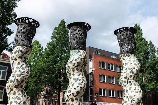 Three columns of Henk Duijn in Amsterdam, Netherlands
