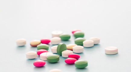 Medicine pills on pastel blue background. Health pharmacy concept