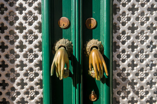 Door knockers in the form of hands, Algarve, Portugal