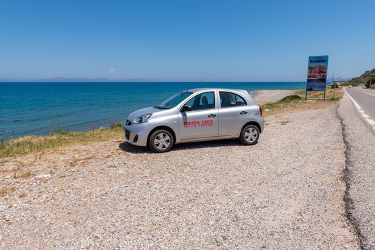 Rhodes, Greece - May 16, 2018: Nissan Micra Car Parked On The Wesrt Coast Of Rhodes Island.