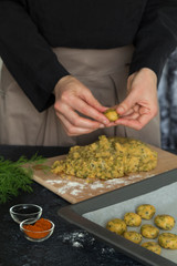 Salted cookies with dill and black cumin in the tray.
