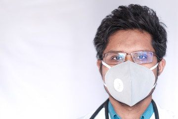 doctor wearing face protective mask against corona virus.
