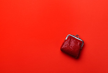 Flat lay top view minimal monochrome composition with red purse
