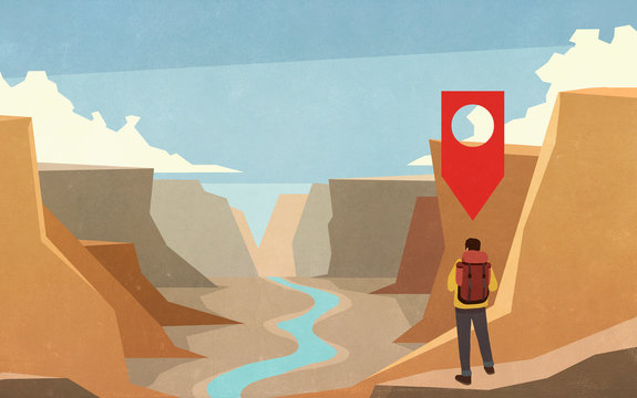 Location pin above male hiker in scenic canyon