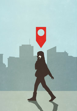 Map pin icon above woman walking and talking on smart phone in city