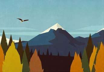 Bald eagle soaring over autumn forest and mountain landscape