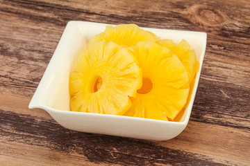 Marinated pineapple rings in the bowl