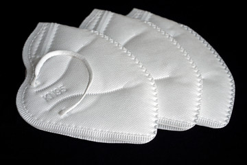 Medical mask ffp2 / N95 / KN95 (personal protective equipment PPE) for pandemic, diseases, flu, coronavirus COVID-19 and pollution. Disposable face mask with valve and dust filter.  