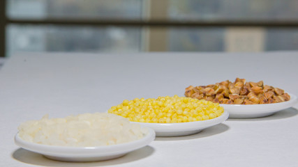 Set of colors food rice millet buckwheats on the plate on the white background