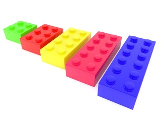 Toy bricks in one row from larger to smaller