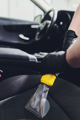 Car interior textile seats chemical cleaning with professionally extraction method. Early spring...