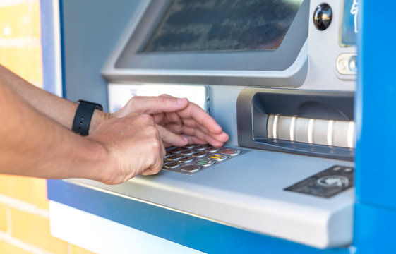 Entering A Credit Card Pin On An ATM Keyboard