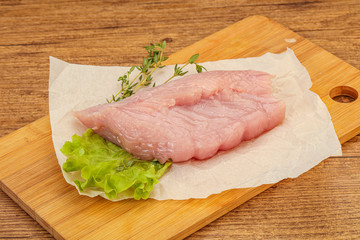 Raw turkey breast steak for cooking