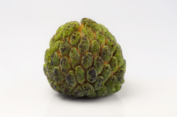 ripe pineapple on a white background