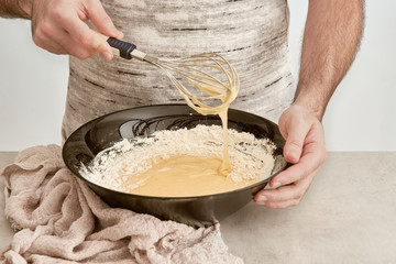 Man making a sponge cake