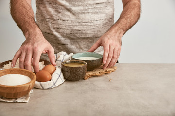 Man making a sponge cake