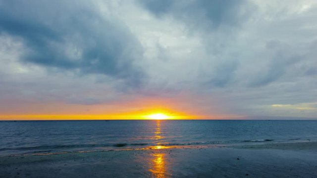 A time lapse video showing a colorful, cloudy sunrise over the ocean from the Philippines shores. Shot and presented at 60 fps. 

