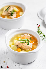Light easy nourishing fish soup. Selective focus, copy space.