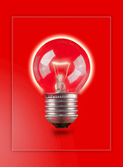 light bulb on red background