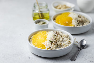 Citrus vegan overnight oatmeal. Selective focus, copy space.