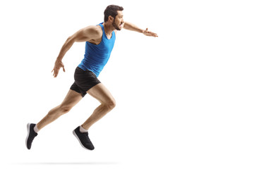 Full length profile shot of a young fit man running sprint