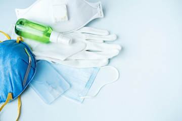 Antivirus set of items: various filtering safety face masks, sanitizer for hands. Protect yourself...