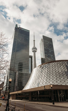 CN Tower between modern buildings in Toronto, Ontario, Canada.