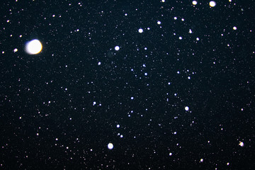 snowflakes falling like a starry night sky with stars