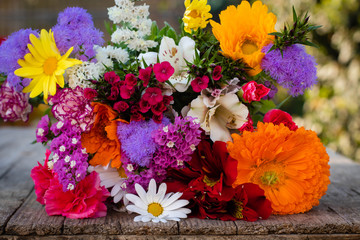 spring beautiful bouquet on wooden surface