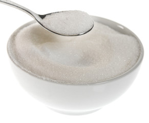 Ceramic bowl with sugar and teaspoon isolated on white background